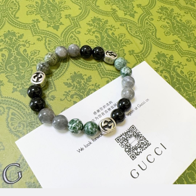 G*u*i bracelets
